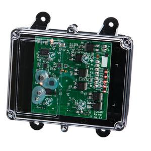 The 4 Function Lodar Replacement FET Receiver from the 92 Series by Lodar LTD features a transparent casing that reveals a green circuit board with numerous electronic components and red lights, highlighting its advanced receiver technology. Ideal for modern replacement systems, it seamlessly blends performance with sleek design.