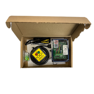 Open cardboard box containing a PIERCE electronic device, cables, and a yellow 2 Function Wireless Remote Control System with buttons.