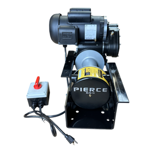 7,500 lbs. 8" Drum 110V AC Industrial Winch with a control switch and power cord, mounted on a black base, is ideal for PIERCE winch systems or as replacement parts.