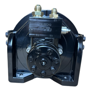 Front view of the 18,000 lb PIERCE Hydraulic Recovery Winch featuring brass connectors and a black mounting bracket, perfect for integration with a vehicle recovery system utilizing a planetary winch.