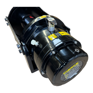 Close-up of the PIERCE 18,000 lb Hydraulic Recovery Winch in black, showcasing yellow warnings and a secure lock mechanism. Perfect for vehicle recovery, it is equipped with a load-holding cone brake to ensure maximum safety and efficiency.