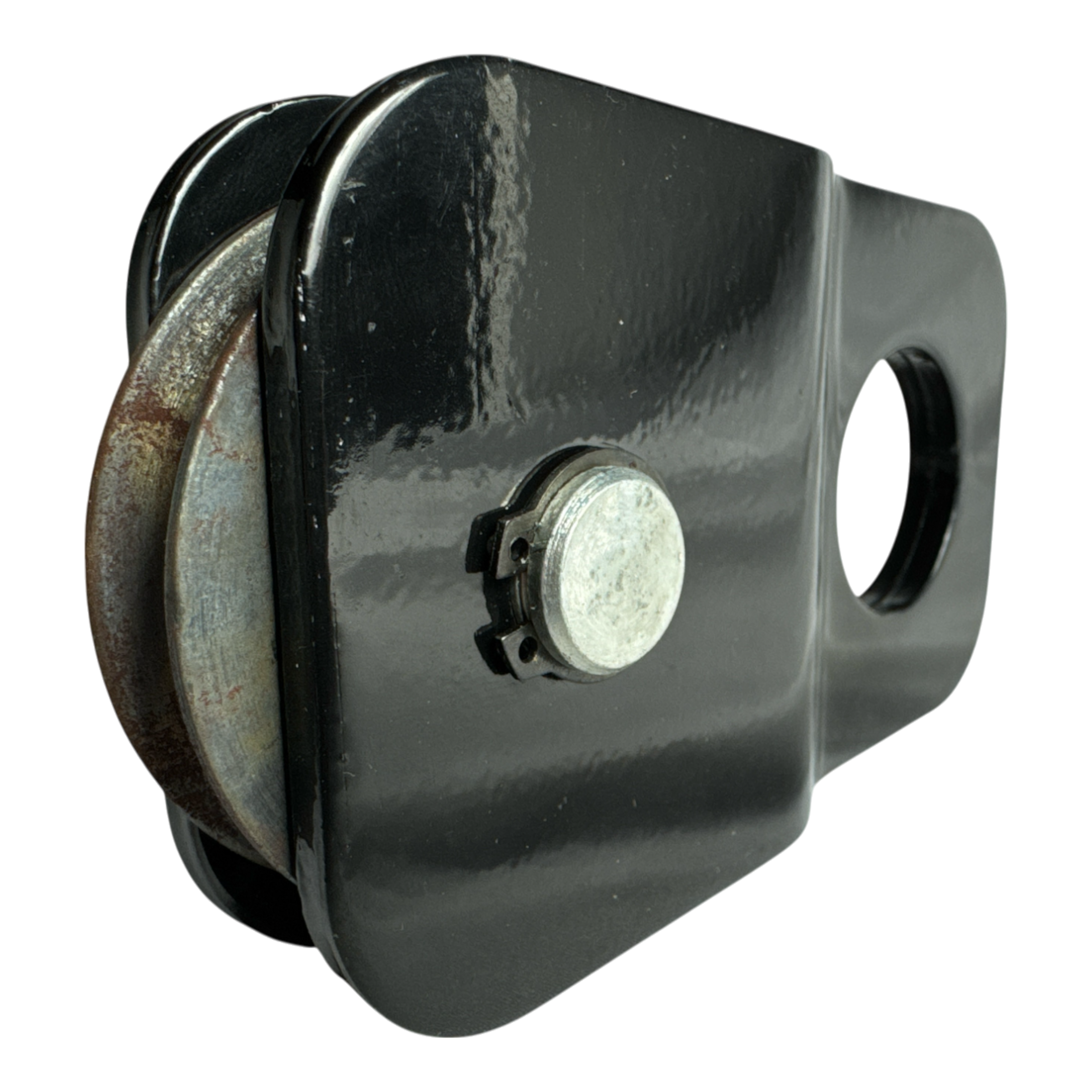 Close-up of a PIERCE Snatch Block WLL 6,000 lbs. featuring a circular metal wheel on a black background.