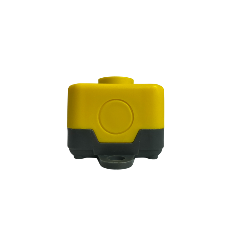 The PIERCE Universal Momentary Pendant Control - 2 Button is a rectangular yellow and gray device for industrial use with a circular top button. Front view against a black background, it resembles a sleek pendant control.