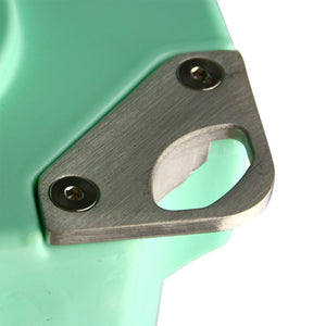 Close-up of a PIERCE Coolers | Bottle Opener attached to the corner of a light green container.