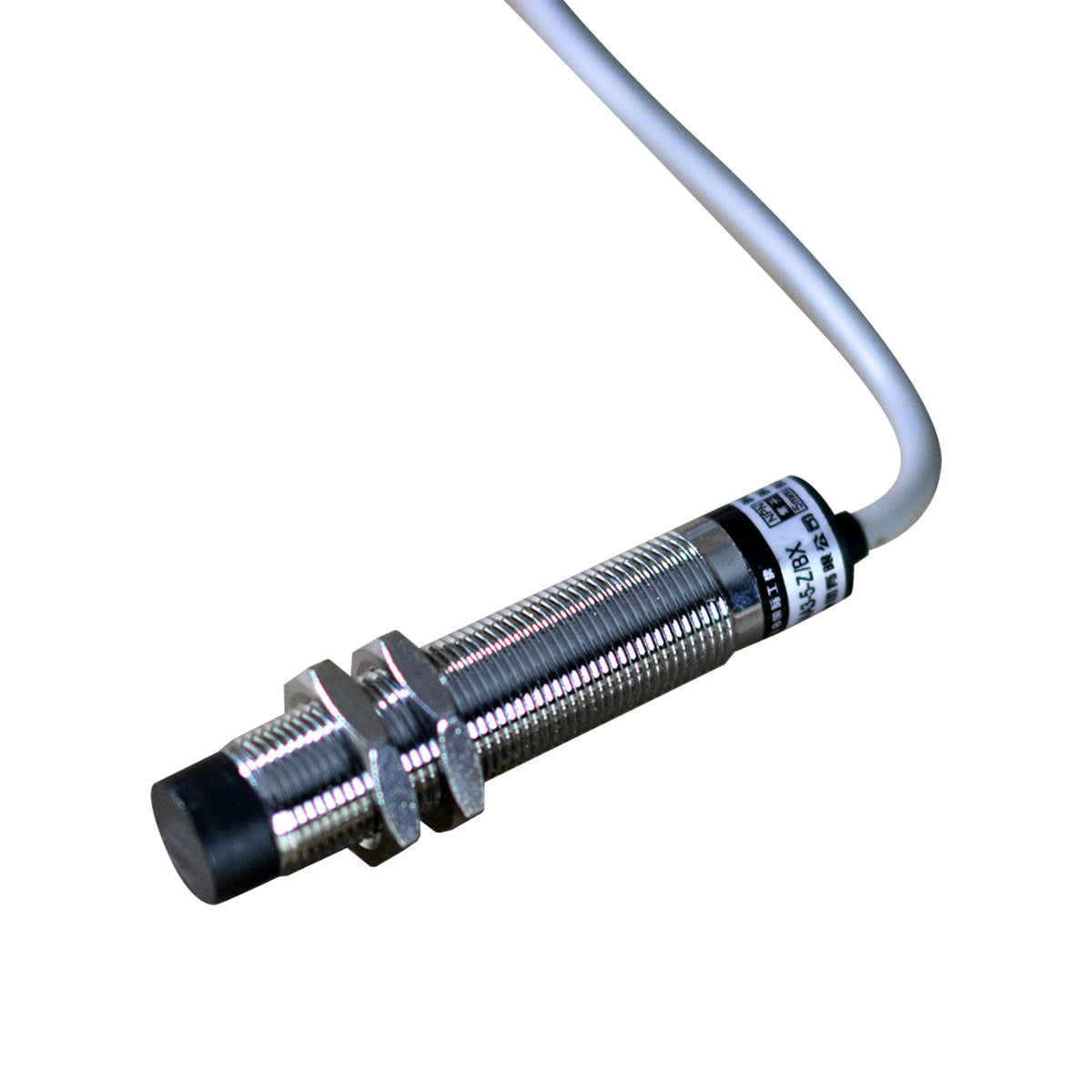 Close-up of a cylindrical metal proximity sensor with a cable attached, seamlessly integrated into the Cattle Cube Counter system by PIERCE to optimize feeding costs.